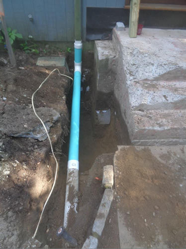 ... and at the same time that the new footings were dug, the failed rood drain system was reconfigured and rebuilt.