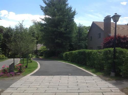 Parkway Pavers - Apron and edging granite material repurposed from the 2010 Fanconia Notch roadway refurbishment project provides a handsome entry.